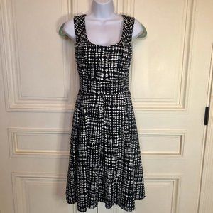 Calvin Klein Sleeveless Cocktail Dress Black and White Print with pleated Skirt